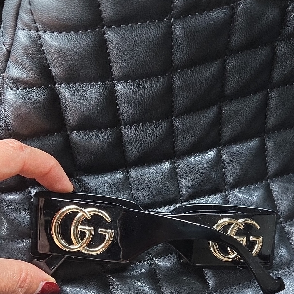 Gucci Black GG Sunglasses with Gold Accents